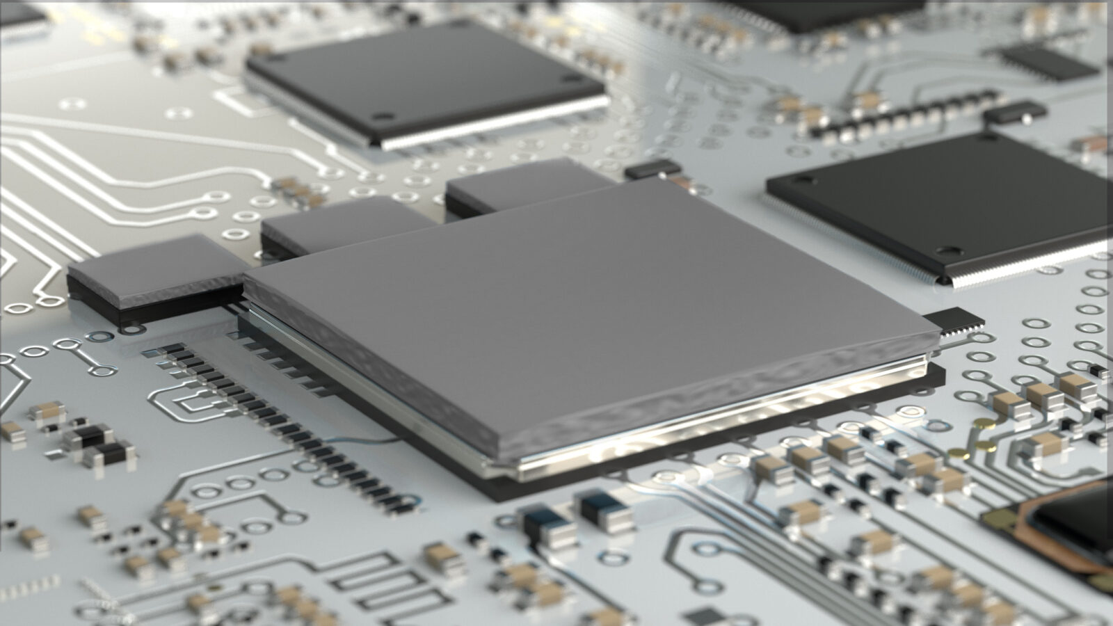 Ein Bild von einer Platine auf der ein Prozessor mit Wärmeleitpaste beschichtet ist